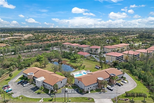 birds eye view of property with a residential view