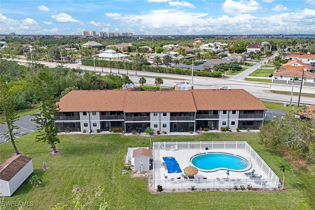 view of pool featuring a residential view