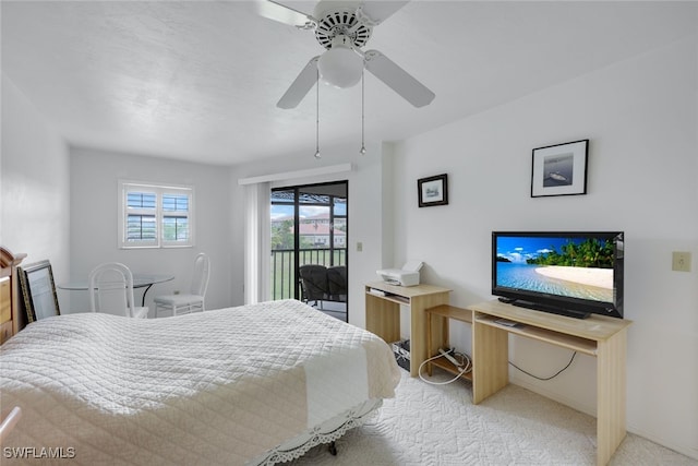 bedroom featuring access to exterior, light colored carpet, and ceiling fan