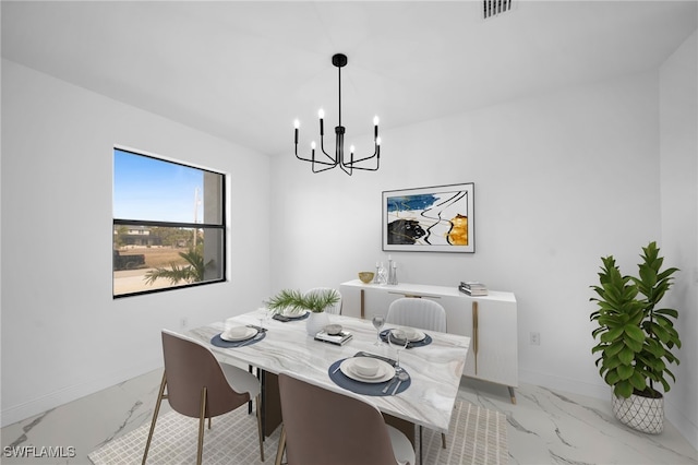 dining area with a chandelier