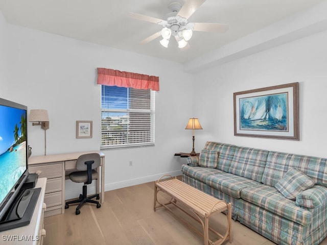 office with ceiling fan and light wood-type flooring