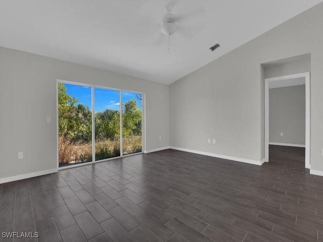 empty room featuring dark hardwood / wood-style flooring and ceiling fan