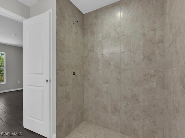 bathroom featuring tiled shower