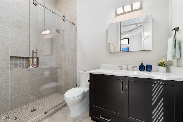 full bathroom with a stall shower, toilet, and vanity