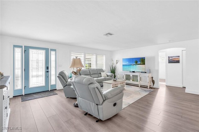 living room featuring light wood-type flooring