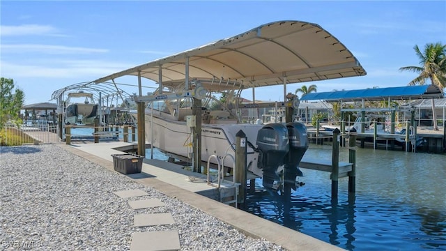 dock area featuring a water view and boat lift