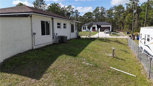 view of yard featuring central AC