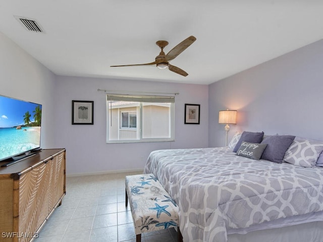 bedroom featuring light tile patterned floors and ceiling fan