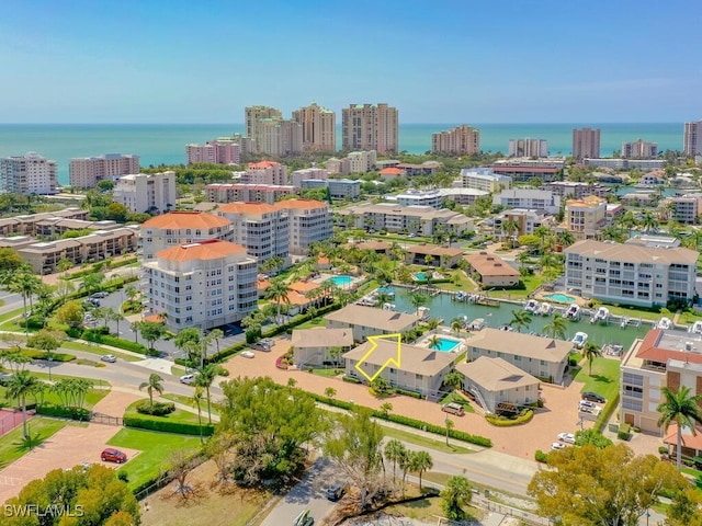 bird's eye view with a water view