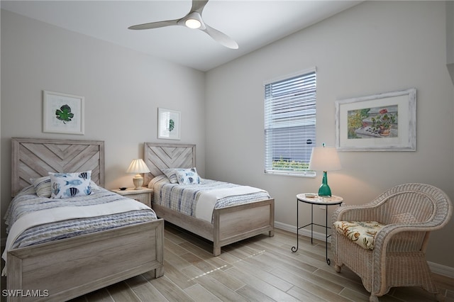 bedroom featuring ceiling fan and light wood-type flooring