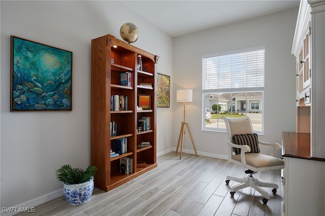 sitting room with light hardwood / wood-style floors