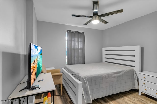 bedroom featuring ceiling fan and light hardwood / wood-style flooring