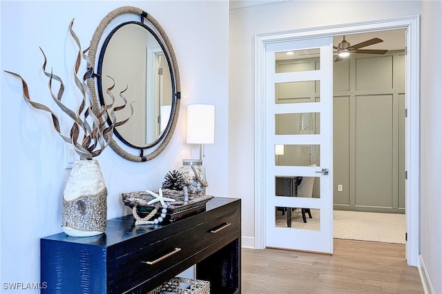 corridor featuring light hardwood / wood-style floors