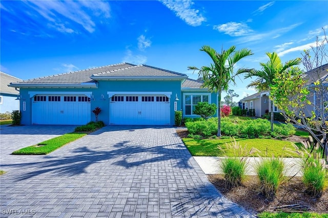 view of front of home with a garage