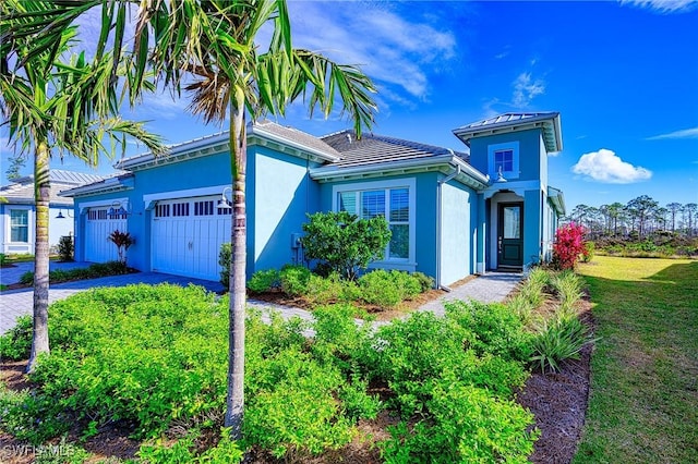 view of front of house with a garage