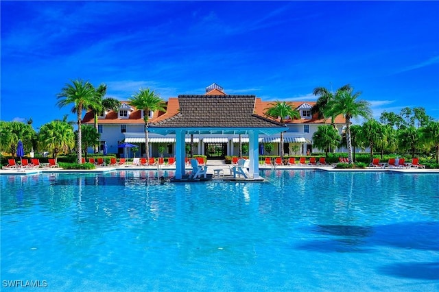 view of swimming pool with a patio