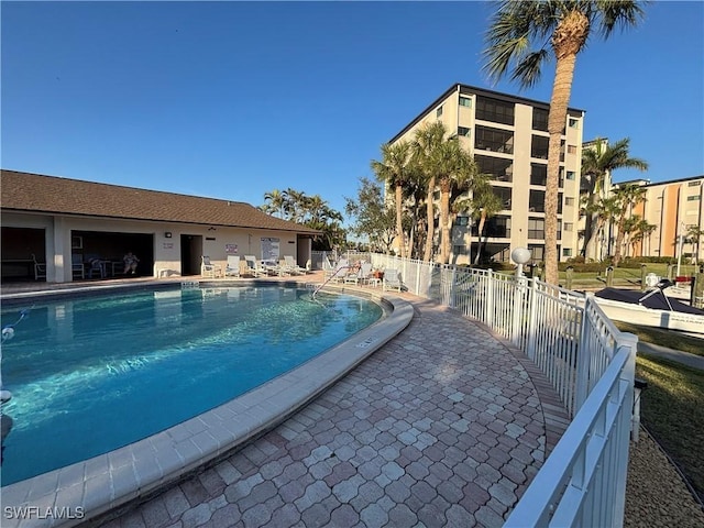 view of pool featuring a patio