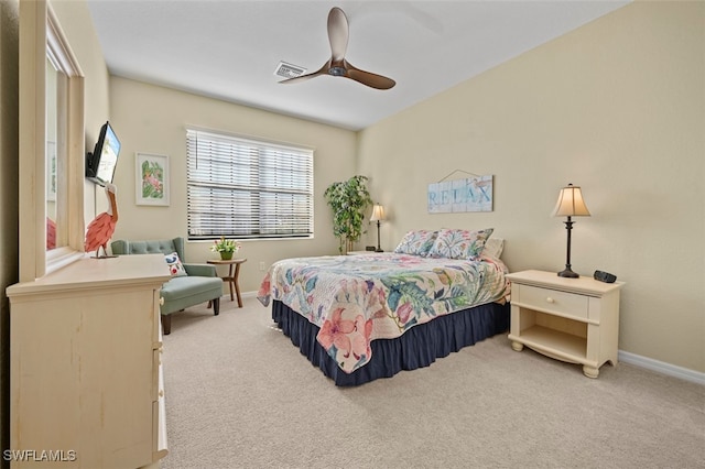 bedroom featuring ceiling fan and light colored carpet