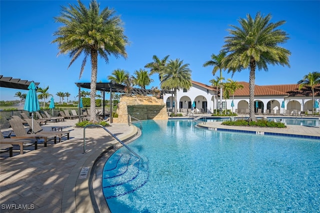 view of pool featuring a patio area