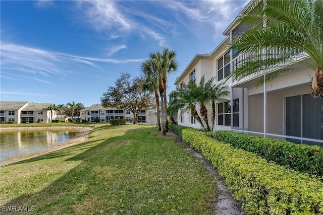 view of yard with a water view