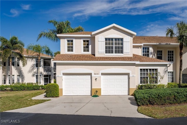 view of front of property with a garage