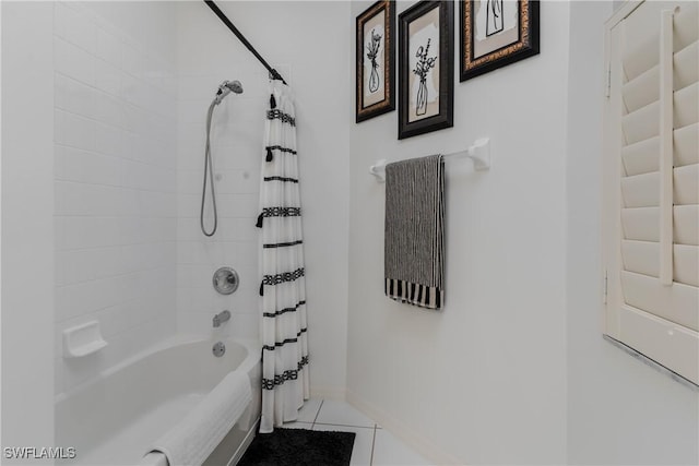 bathroom featuring tile patterned flooring and shower / tub combo