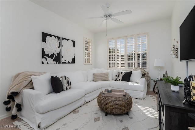 living room featuring ceiling fan