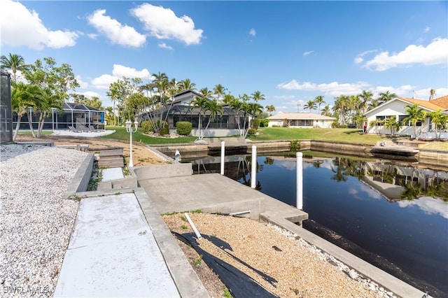 dock area with a water view and a lanai