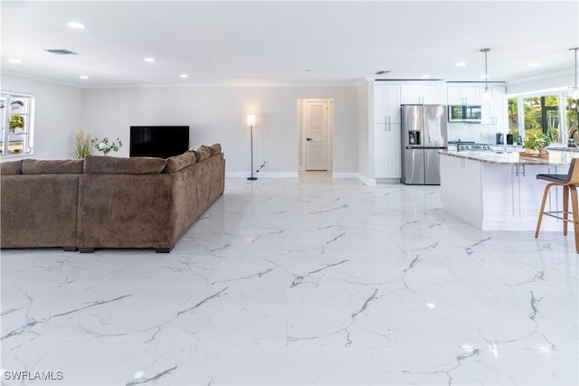 living room with crown molding