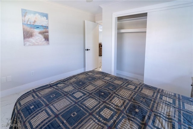 bedroom featuring ornamental molding and a closet