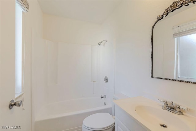 full bathroom featuring shower / tub combination, vanity, and toilet