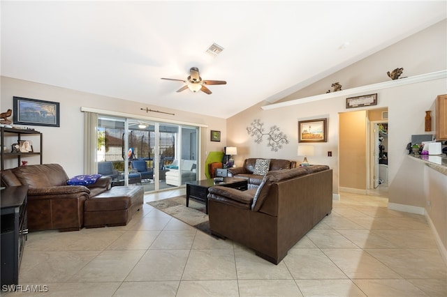 tiled living room with ceiling fan and vaulted ceiling