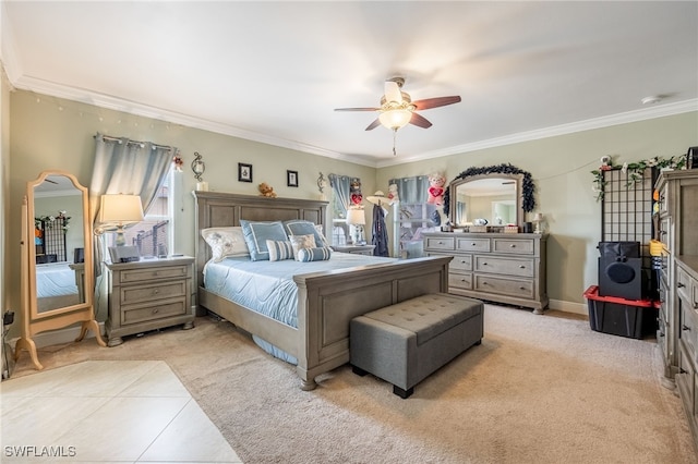 bedroom featuring crown molding, light colored carpet, and ceiling fan