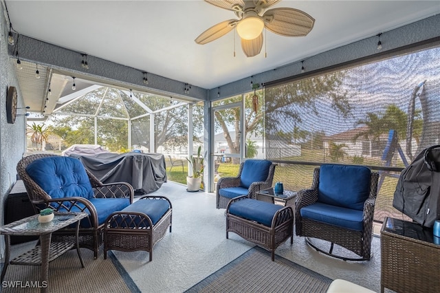 view of patio / terrace featuring a lanai, an outdoor hangout area, and ceiling fan