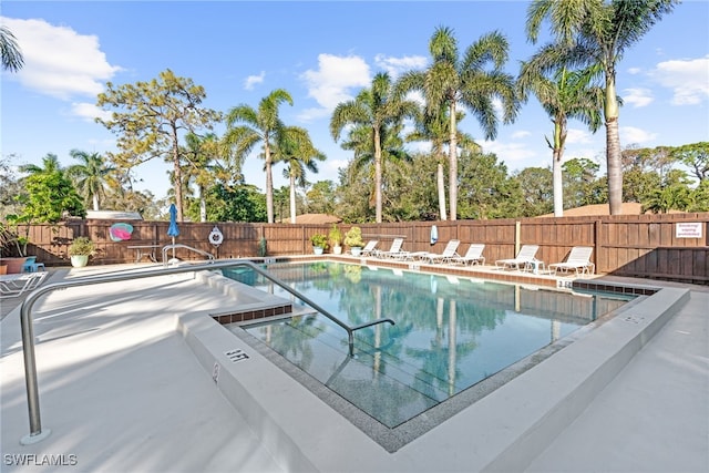 view of pool featuring a patio