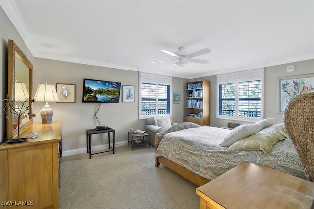 bedroom with ceiling fan, ornamental molding, and light carpet