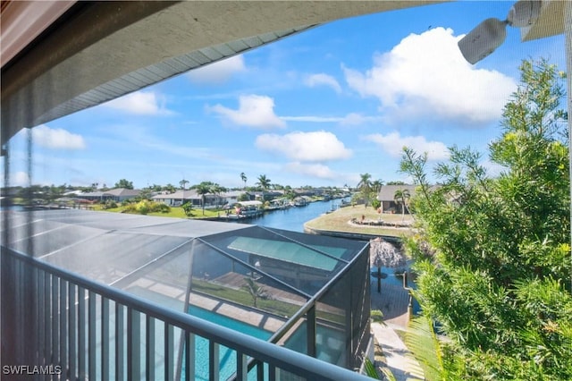 balcony featuring a water view