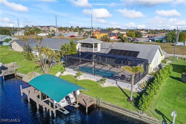 bird's eye view with a water view