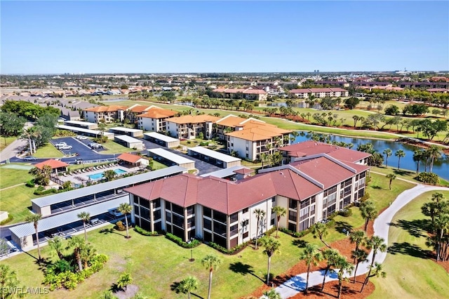 drone / aerial view with a water view