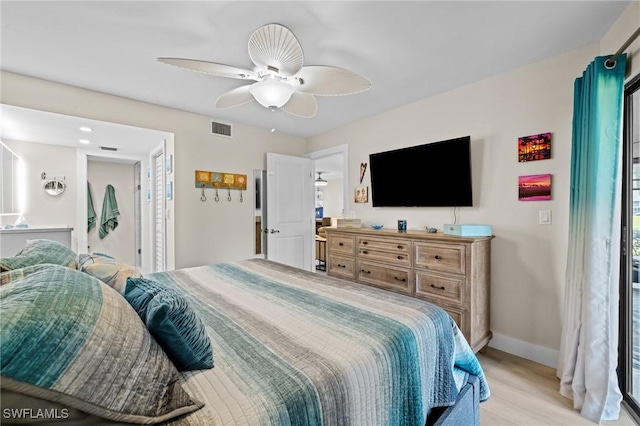 bedroom featuring ceiling fan and light wood-type flooring