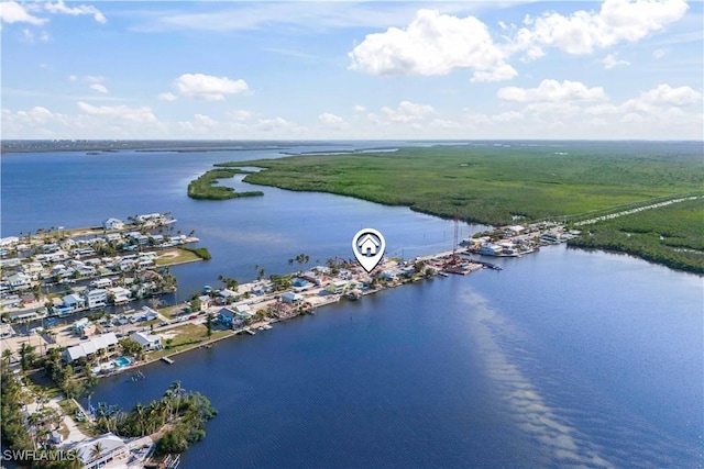 drone / aerial view with a water view