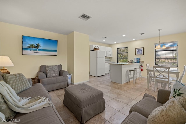 living room featuring light tile patterned floors