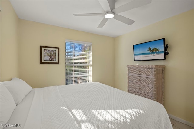 bedroom featuring ceiling fan and light tile patterned floors