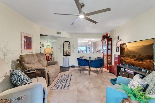 living room featuring ceiling fan