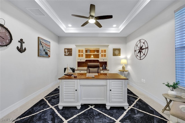 office area featuring ornamental molding, a raised ceiling, and ceiling fan