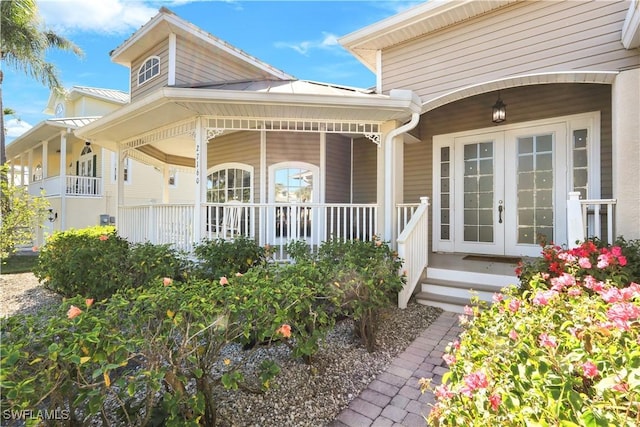 doorway to property with french doors and covered porch