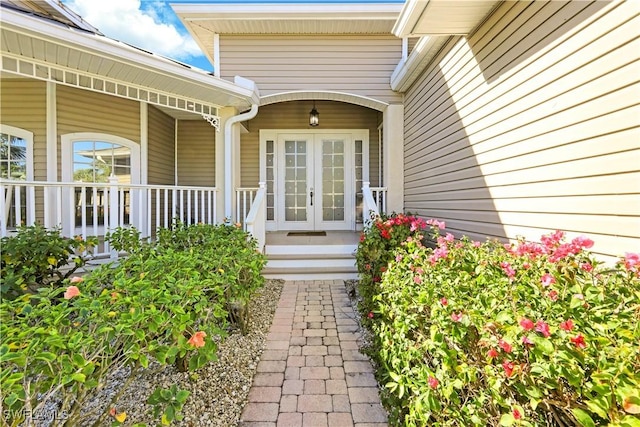 property entrance featuring french doors