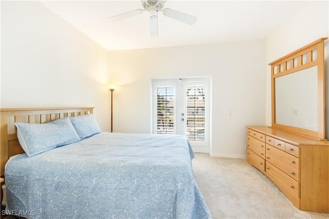 bedroom with ceiling fan, access to exterior, and light carpet