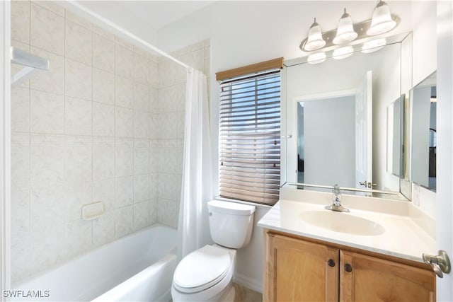 full bathroom featuring vanity, toilet, and shower / tub combo