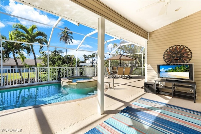 view of swimming pool featuring an in ground hot tub, a patio, and glass enclosure